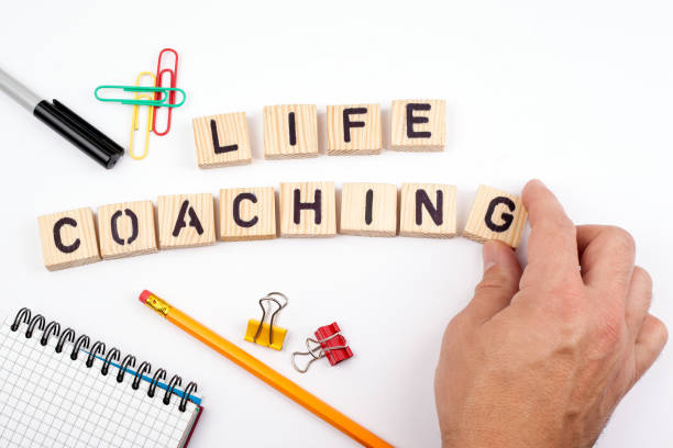 life coaching. Wooden letters on a white background life coaching. Wooden letters on a white background